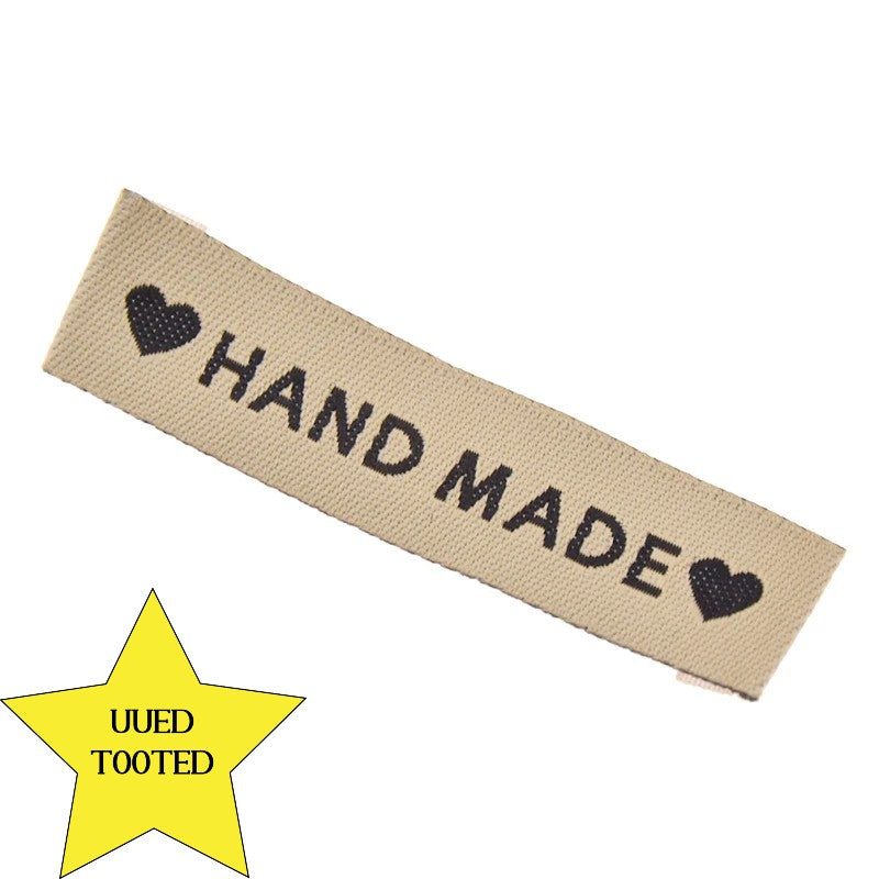 Handmade label on textile printed