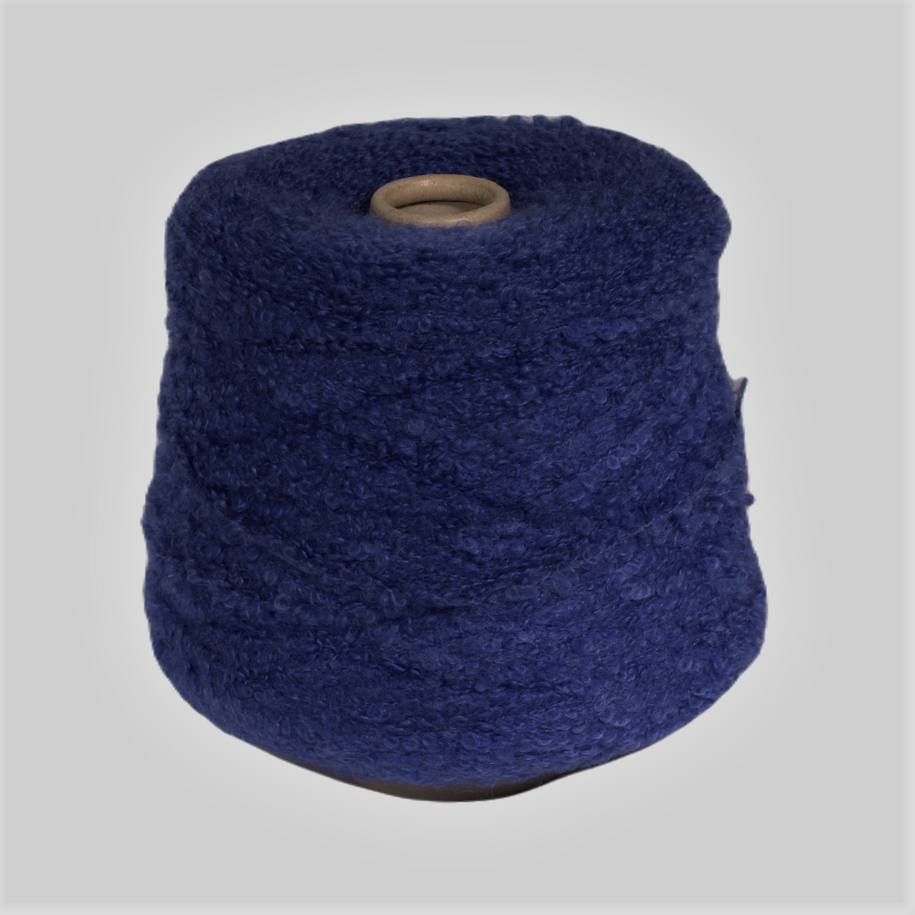 Botero boucle yarn with kid-mohair and merino c.blue, yarn on cone